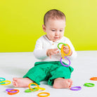 Bright Starts, Lots of Links Rings Toys, Soothing & Teething Toy, Clip on Pram, Pushchair or Car Seat, Textured Sensory Toy, Stroller Take Along Toy, BPA-Free, 24 Pcs, Ages 0 Months +