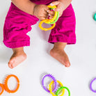 Bright Starts, Lots of Links Rings Toys, Soothing & Teething Toy, Clip on Pram, Pushchair or Car Seat, Textured Sensory Toy, Stroller Take Along Toy, BPA-Free, 24 Pcs, Ages 0 Months +